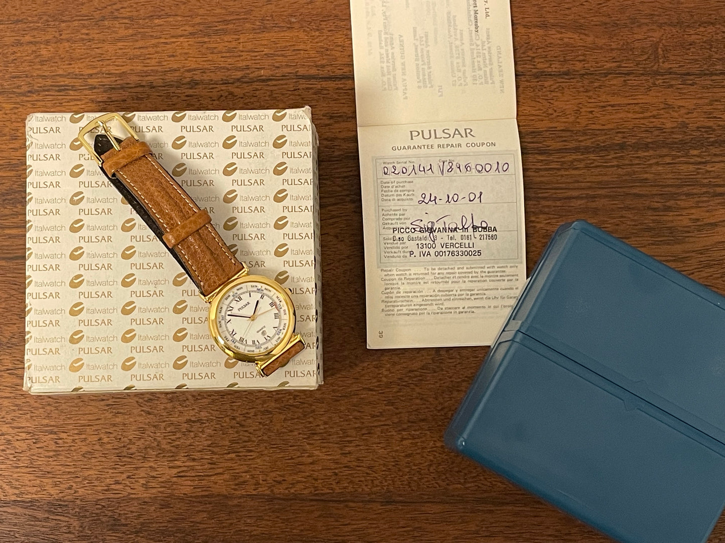(2000) Pulsar V896-0010 dress watch - white dial w/ black Roman numerals & pointer day (mint)