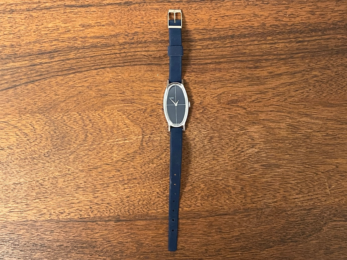 (1970s) Timex 519-105 dress watch - elongated oval case - black cross dial - small size (NOS + full set)
