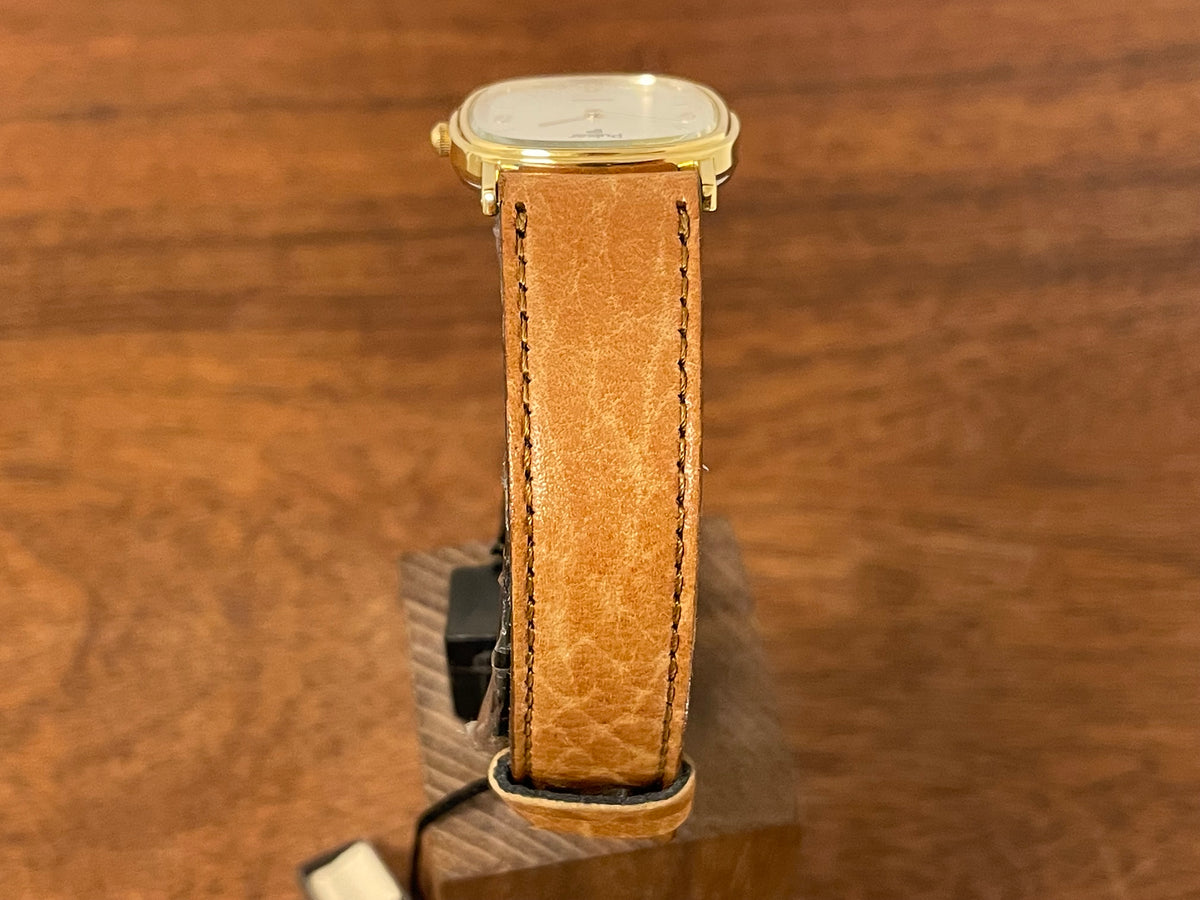 (1985) Pulsar V320-5029 "Ellipse" dress watch - gold case - diamond dust dial (NOS)
