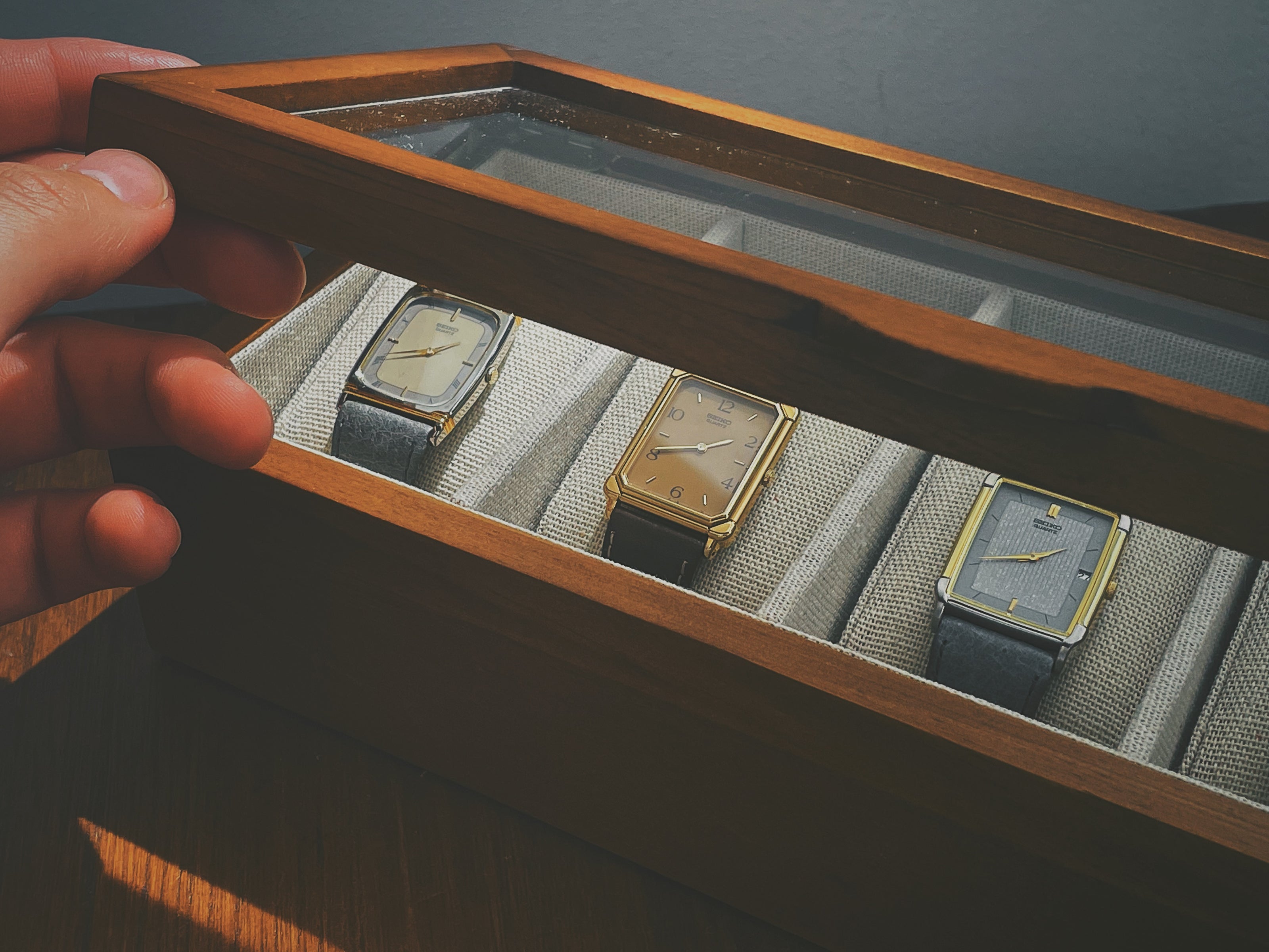 Box with vintage Seiko "Tank" watches