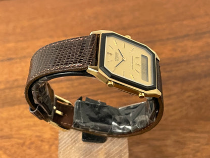 (1984) Seiko H448-5130 Alarm Chronograph - gold dial w/ gold markers & digital display