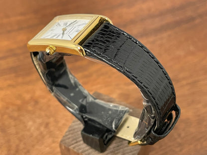 (1998) Tiffany & Co. Portfolio "Tank" dress watch - gold case - white dial w/ black Roman numerals (Mint)