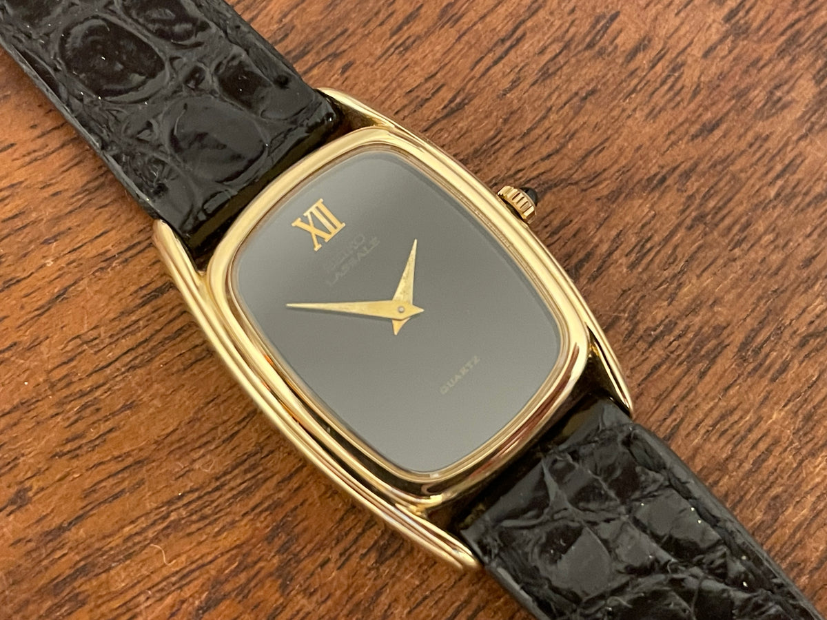 (1980) Seiko 1400-7249 Lassale "Ellipse" dress watch - black dial w/ gold Roman numerals - small size (NOS)