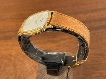 (1985) Pulsar V320-5029 "Ellipse" dress watch - gold case - diamond dust dial (NOS)