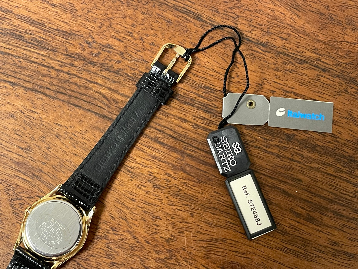 (1986) Seiko 2A24-0040 dress watch - white dial w/ moonphase & Roman numerals - small size (NOS)