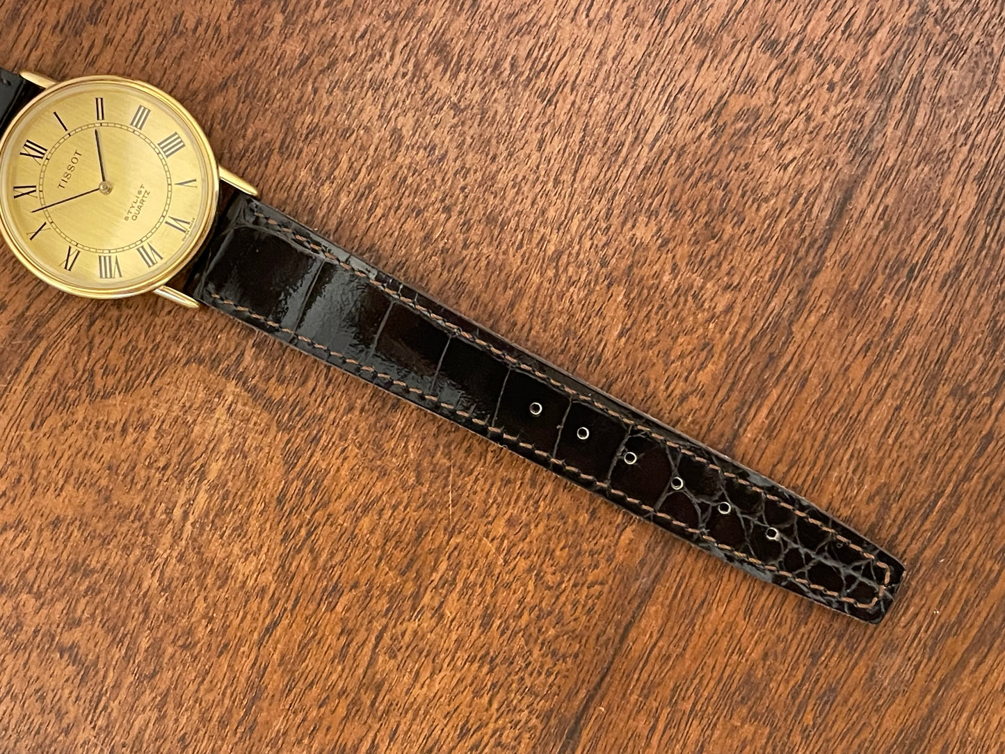 (1970s) Tissot 40771 Stylist dress watch - gold case - brushed gold dial w/ black Roman numerals (NOS)