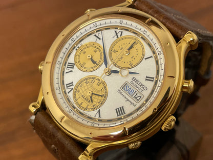 (1992) Seiko 7T39-7A00 Age of Discovery (AOD) chronograph -  gold case w/ white speckled dial (NOS)