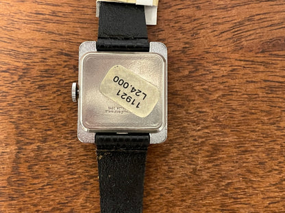 (1970s) Timex "Tank" dress watch - silver case - white dial w/ Roman numerals - small size (NOS)
