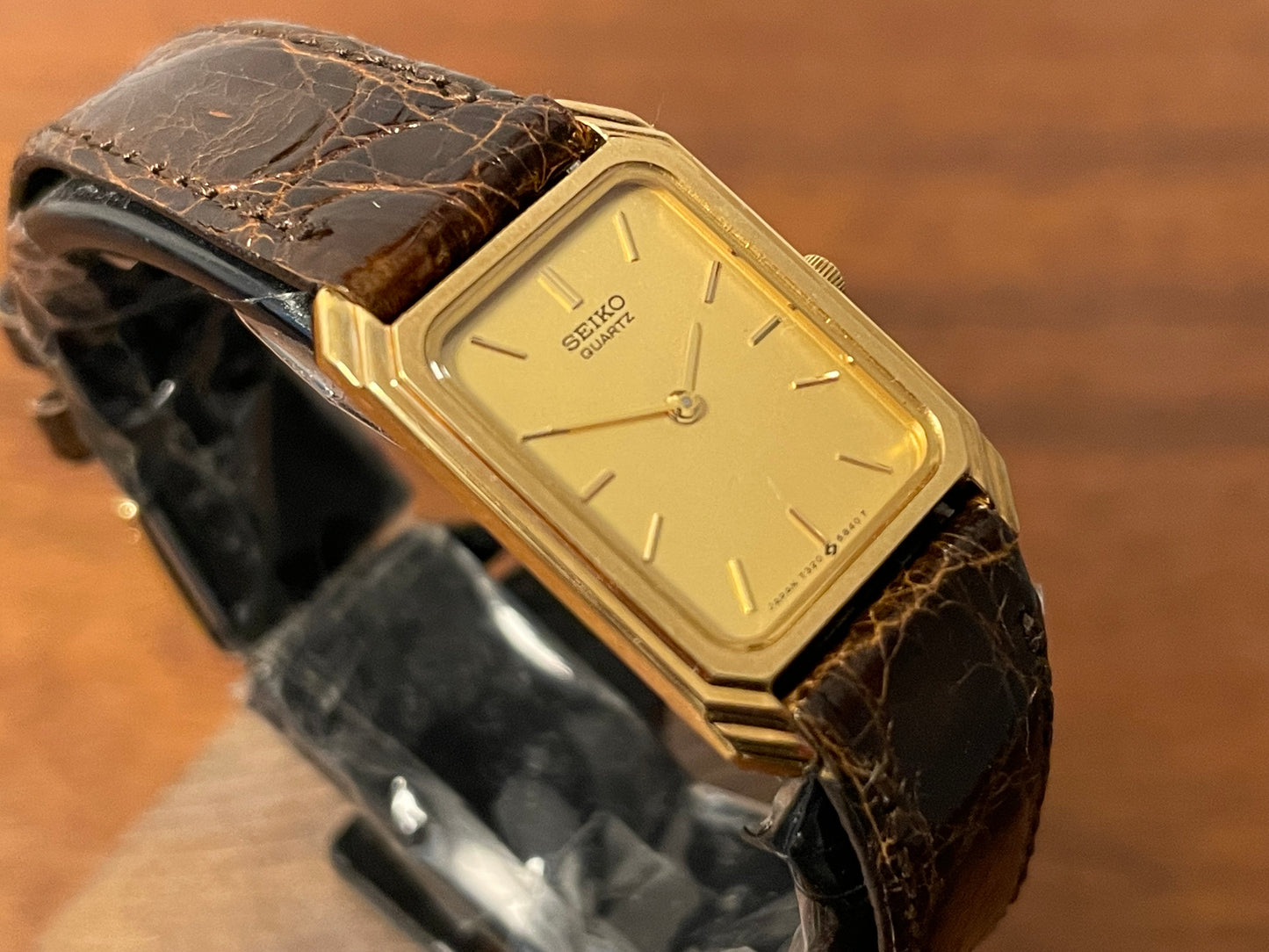 (1983) Seiko 7320-5500 "Tank" dress watch - gold dial w/ gold markers - small size (NOS)