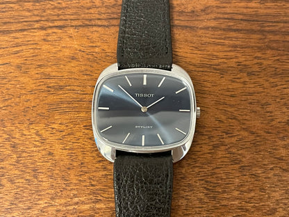 (1970s) Tissot 41436 Stylist dress watch - silver “tv case” - sunburst blue dial w/ silver stick markers (NOS)