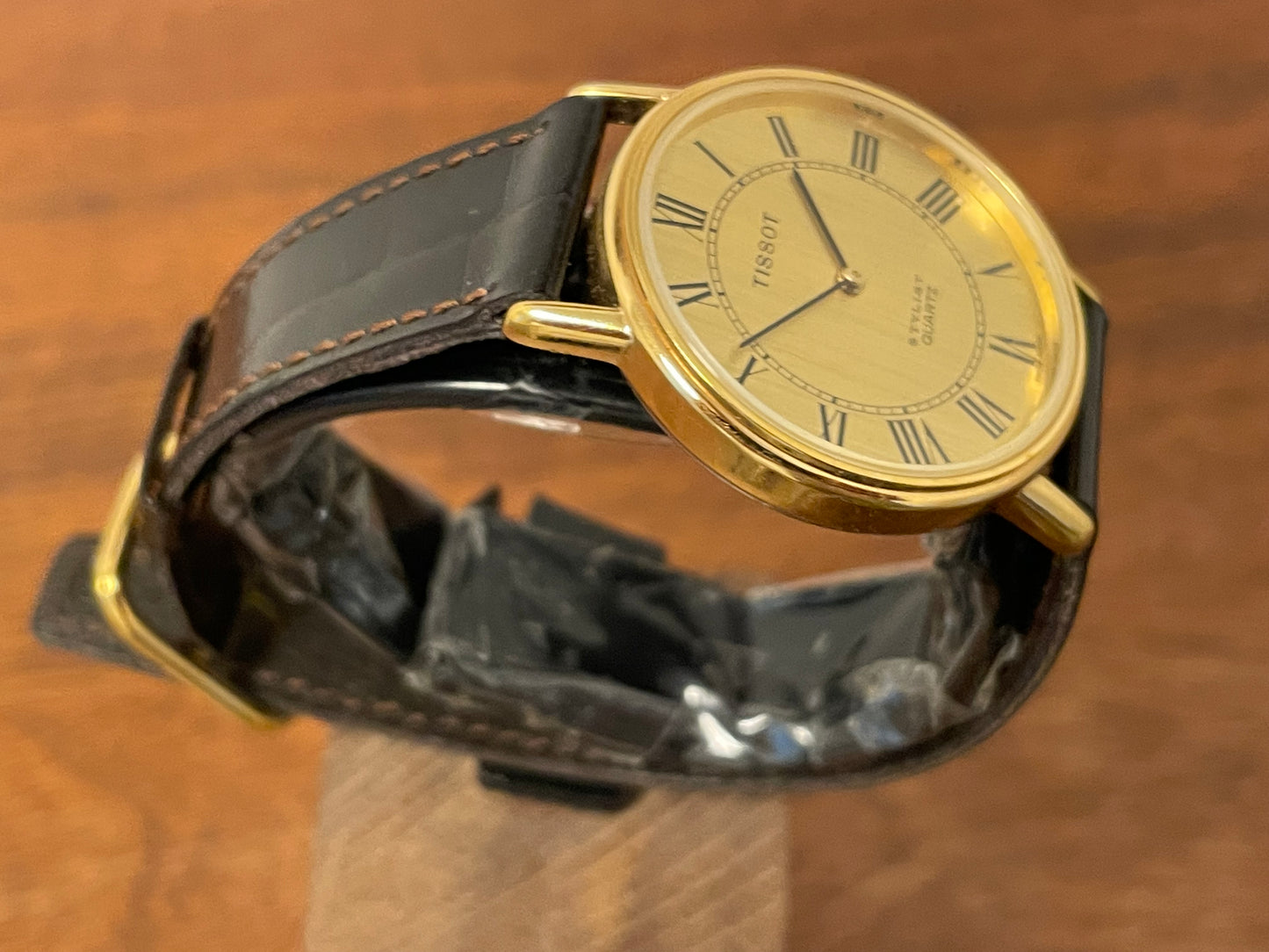 (1970s) Tissot 40771 Stylist dress watch - gold case - brushed gold dial w/ black Roman numerals (NOS)