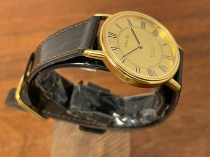 (1970s) Tissot 40771 Stylist dress watch - gold case - brushed gold dial w/ black Roman numerals (NOS)