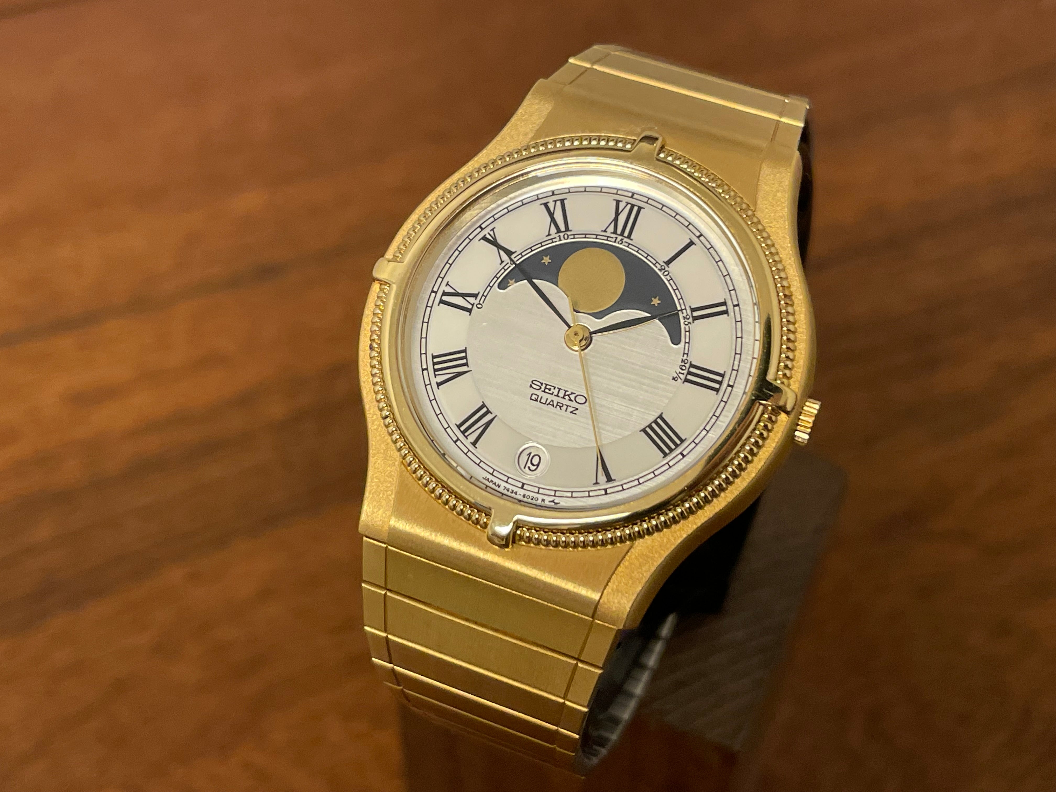 1985) Seiko 7434-6010 gold colored dress watch with moon phase 