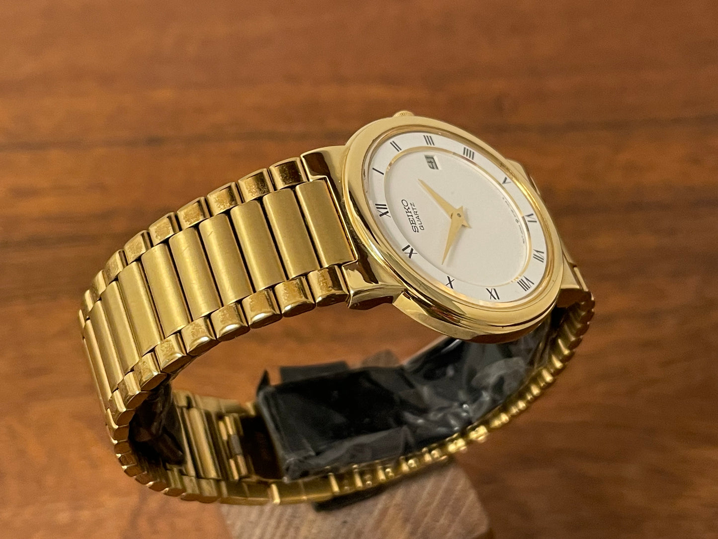 (1992) Seiko 5Y89-7A10 dress watch – white dial w/ Roman numerals & date (NOS)