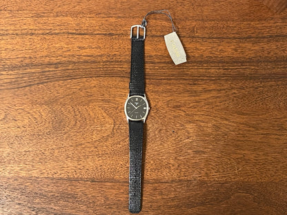 (1982) Pulsar Y112-5099 "Ellipse" dress watch - silver case - black dial w/ silver stick markers (NOS)