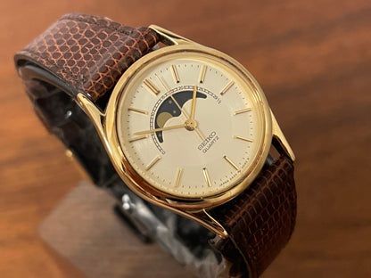 (1985) Seiko 2A24-0040 dress watch - champagne dial w/ moonphase & stick markers - small size (NOS)