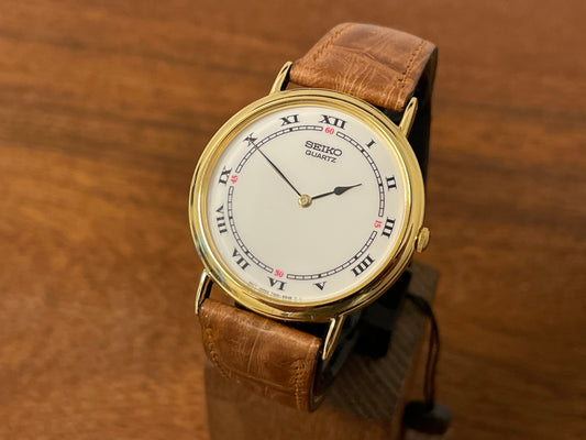 Front side (1992) Seiko 7N00-6A00 dress watch - white dial w/ Roman numerals & Spade hands (NOS)