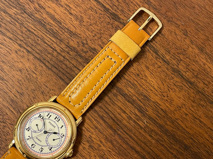 (1988) Pulsar V336-7040 dress watch - gold colored case - creme dial w/ Arabic numerals