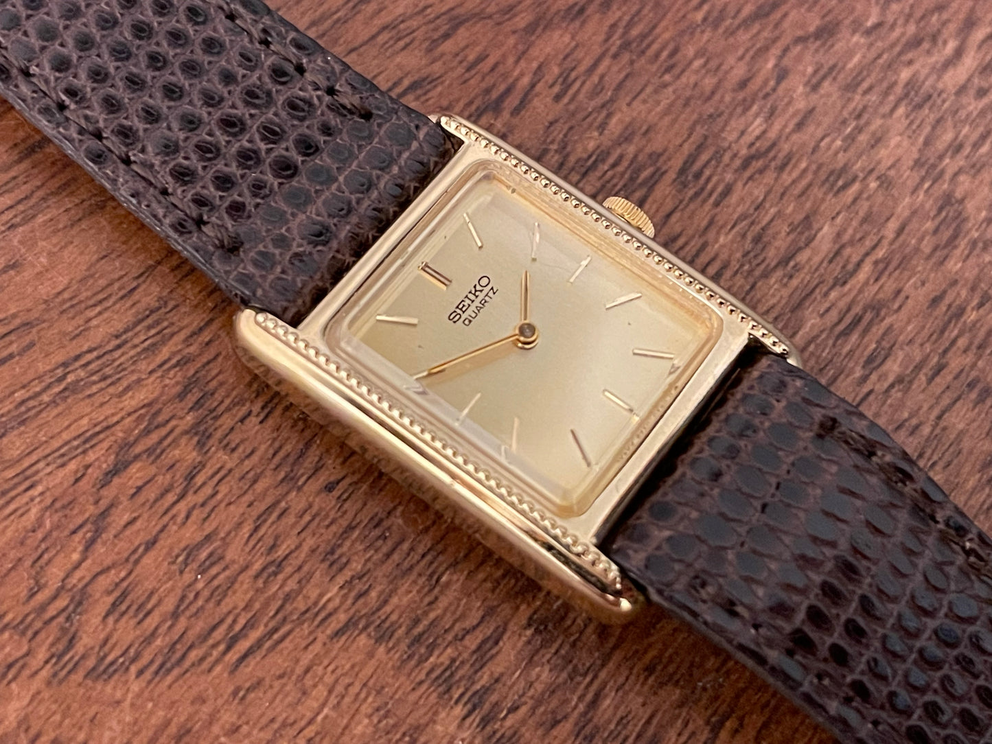 (1982) Seiko 5420-5100 "Tank" dress watch - brushed gold dial w/ gold markers - small size (NOS)