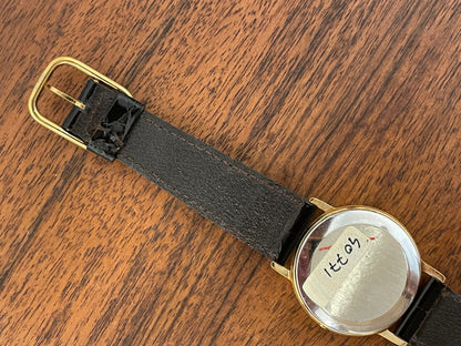(1970s) Tissot 40771 Stylist dress watch - gold case - brushed gold dial w/ black Roman numerals (NOS)