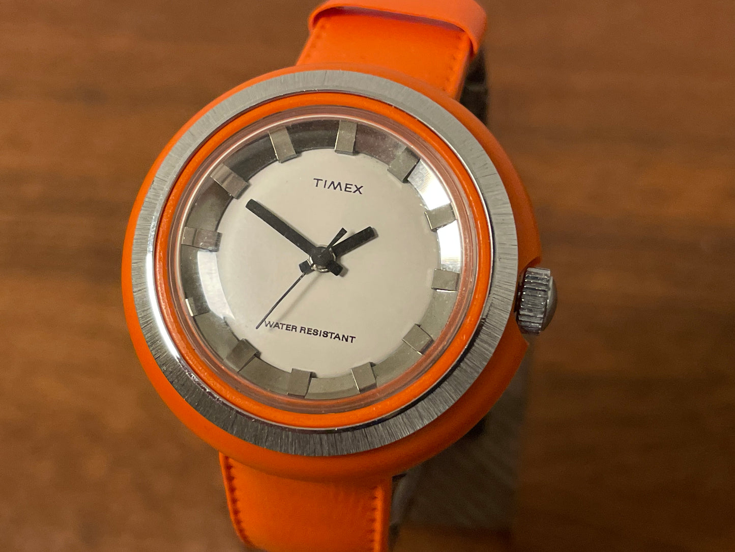(1970s) Timex 290-181 UFO - orange plastic case - white dial w/ silver markers - small size (NOS + full set)