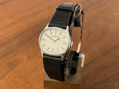 Front side (1970s) Tissot 052-15007 Stylist dress watch - silver cushion case - silver brushed dial w/ silver stick markers - small size (NOS)