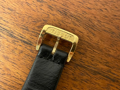 (1970s) Tissot Stylist dress watch - gold “tv case” - white dial w/ black Roman numerals (NOS)
