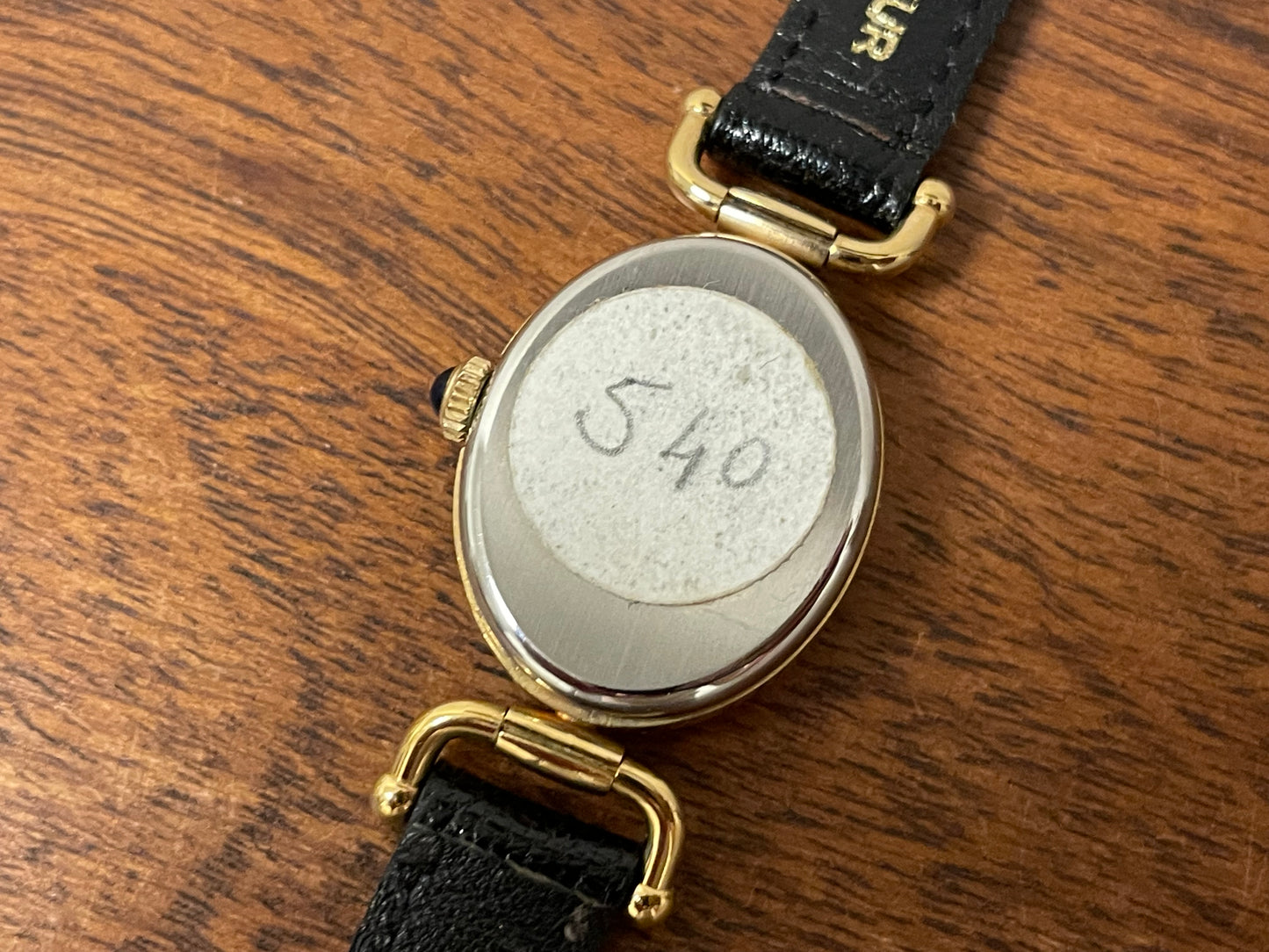 (1980s/1990s) Bulova Paris dress watch - oval case - cream dial w/ black Arabic numerals - small size (NOS)