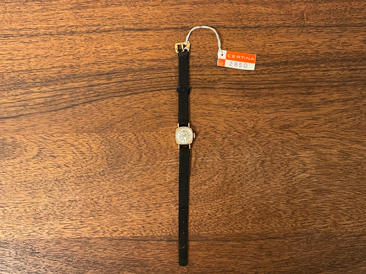 (1970s) Certina 2850 "cocktail" dress watch - silver sunburst dial w/ stick markers - small size (NOS)