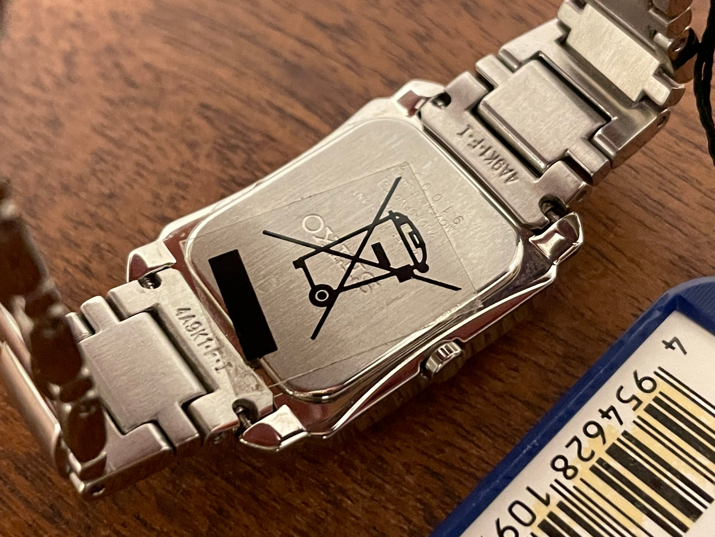 (1999) Seiko 7N01-0FW0  - "Tank" style case - silver dial w/ silver Roman numerals - small size (NOS)