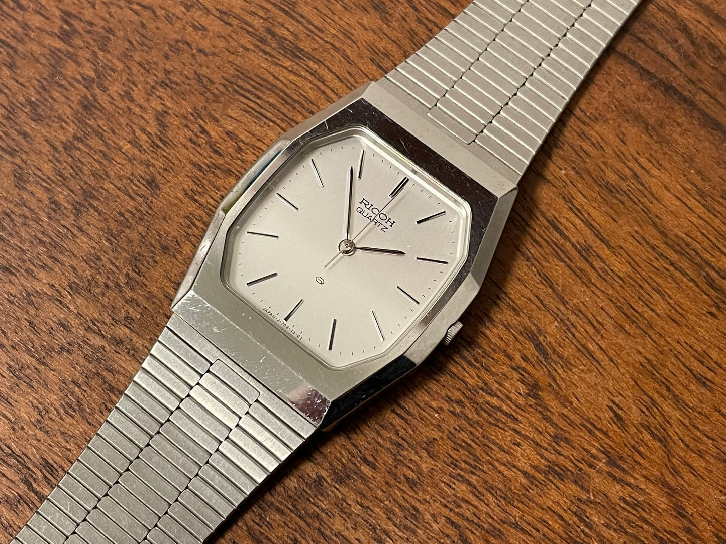 (1977) Ricoh 702008SS dress watch - silver brushed dial w/ silver markers (NOS)