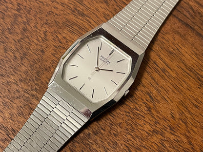 (1977) Ricoh 702008SS dress watch - silver brushed dial w/ silver markers (NOS)