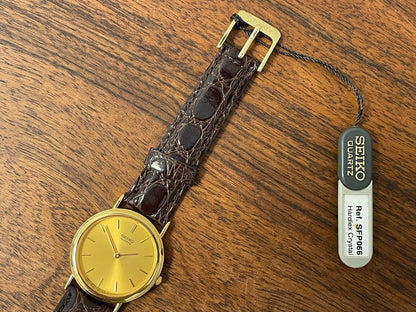 (2004) Seiko 7N00-6A70 dress watch -gold dial w/ gold markers - small size (NOS)