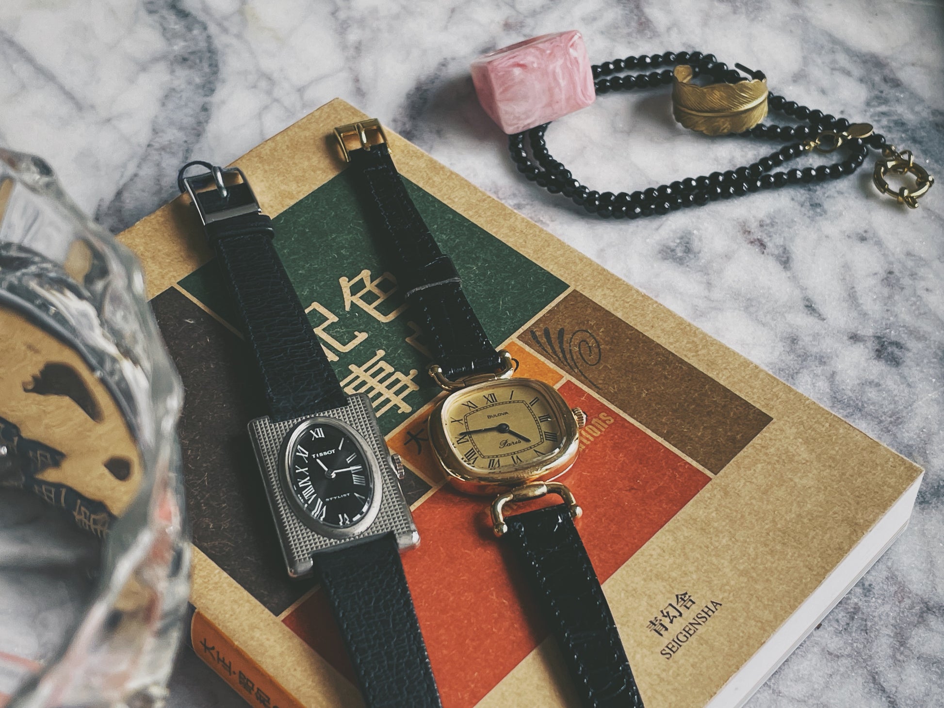 A vintage ladies Tissot 19430 next to a Bulova Paris dress watch