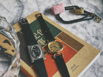 A vintage ladies Tissot 19430 next to a Bulova Paris dress watch