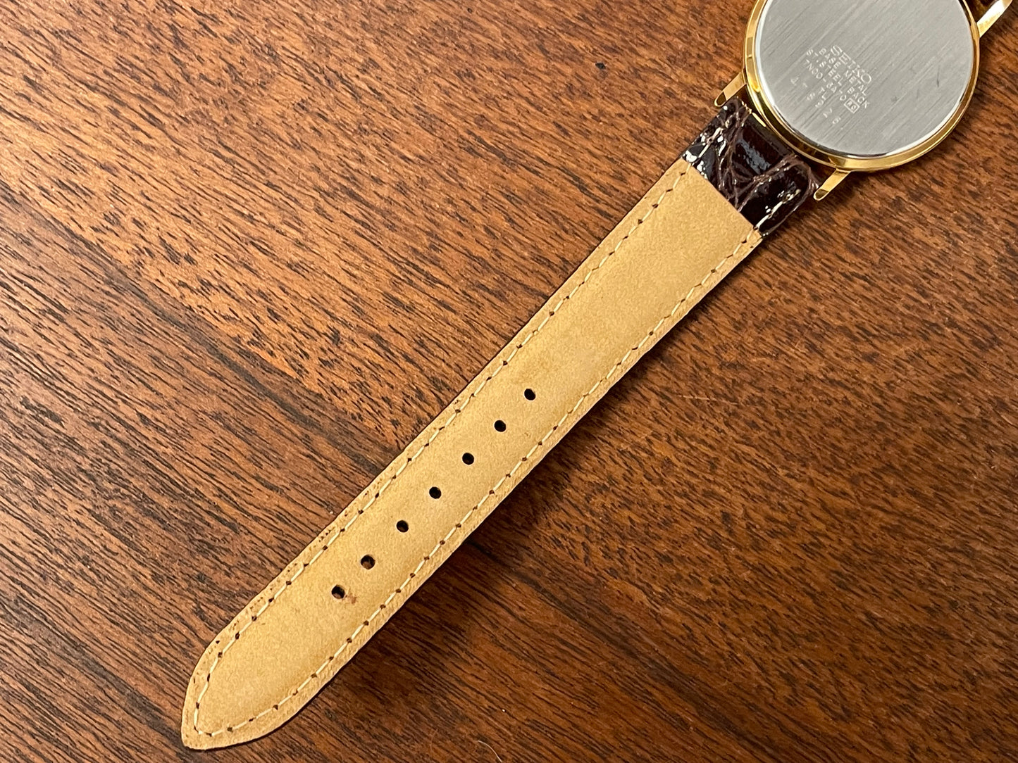 (2004) Seiko 7N00-6A70 dress watch -gold dial w/ gold markers - small size (NOS)