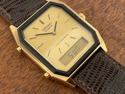(1984) Seiko H448-5130 Alarm Chronograph - gold dial w/ gold markers & digital display