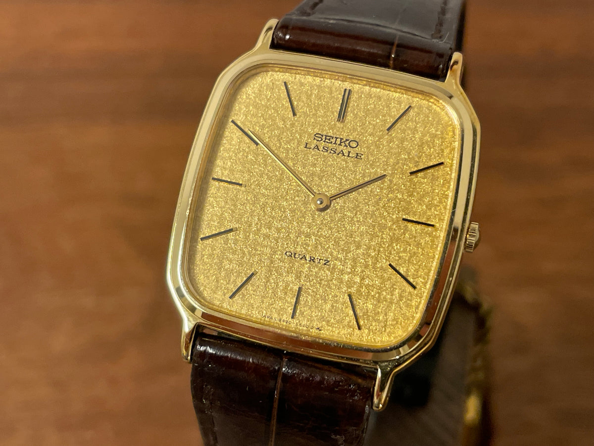 (1981) Seiko 5930-5509 Lassale dress watch - gold textured dial w/ gold stick markers (NOS)