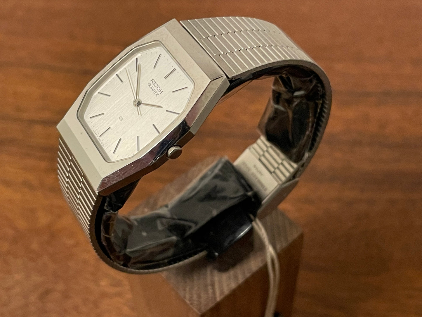 (1977) Ricoh 702008SS dress watch - silver brushed dial w/ silver markers (NOS)