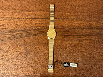 (1983) Seiko 8420-0140 dress watch - gold case - gold sunburst dial w/ gold stick markers (NOS)
