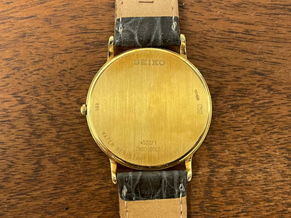 (1994) Seiko 7N00-S007 "Gold" 18K gold collection dress watch - 18k solid gold case - white dial w/ gold markers
