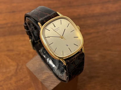 (1970s) Citizen 47-5181 "Ellipse" dress watch - 18K solid gold case - brushed champagne dial w/ gold markers