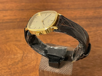 (1970s) Citizen 47-5181 "Ellipse" dress watch - 18K solid gold case - brushed champagne dial w/ gold markers