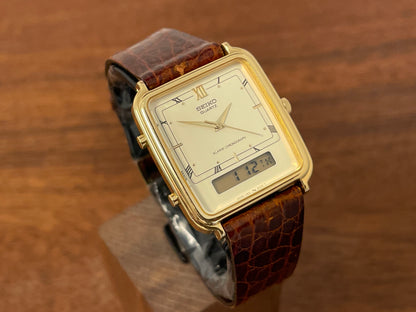 (1985) Seiko H601-5010 Alarm Chronograph - cream dial w/ gold Roman numerals (mint)