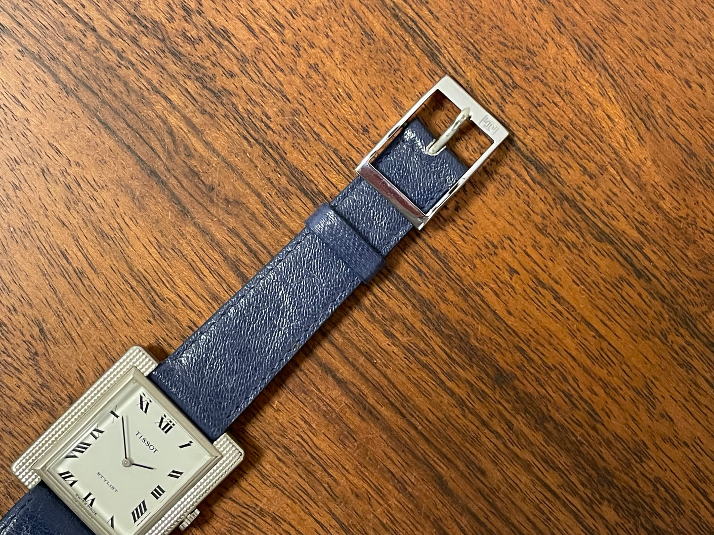 (1970s) Tissot Stylist "Tank" - decorated case - white dial w/ black Roman numerals (NOS)