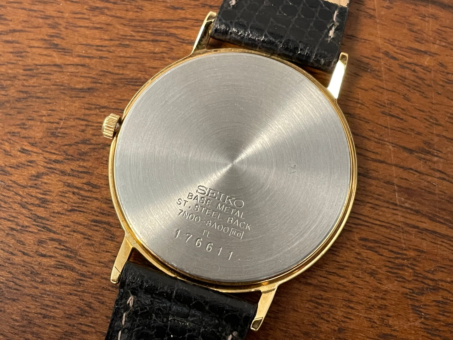 (1991) Seiko 7N00-8A00 dress watch - white dial w/ Roman numerals & Leafe hands (NOS)