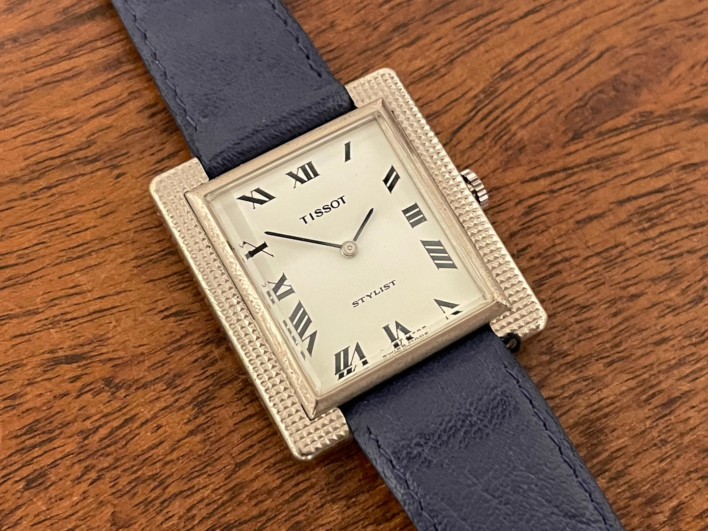 (1970s) Tissot Stylist "Tank" - decorated case - white dial w/ black Roman numerals (NOS)