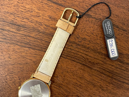 (1989) Seiko 5Y94-8000 dress watch - gold case - cream dial w/ black Roman numerals (NOS)