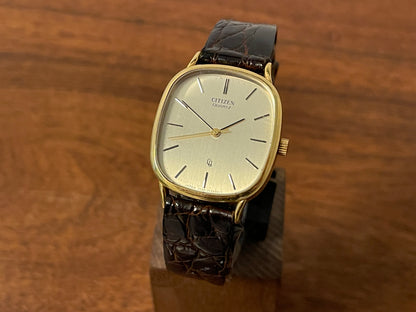 Front side (1970s) Citizen 47-5181 "Ellipse" dress watch - 18K solid gold case - brushed champagne dial w/ gold markers