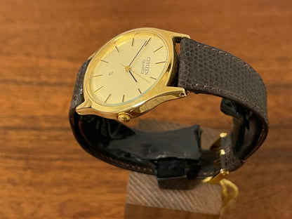 (1987) Citizen 37-9085-82 dress watch - gold colored case w/ champagne dial (NOS)